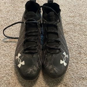 Under Armour football cleats. These look brand new!! Size 13